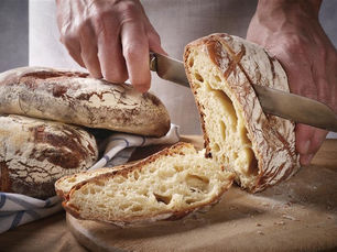 Sourdough being sliced